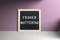 Letter board with German message HAPPY MOTHER`S DAY