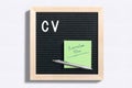 Letter board with message CV and sticky note with text `curriculum vitae`