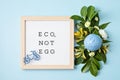 Letter board with text eco, not ego. Save the planet idea. Royalty Free Stock Photo