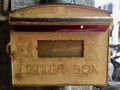 A light golden Letter Box