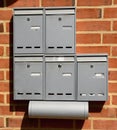 Letter Boxes on a Brick Wall Royalty Free Stock Photo