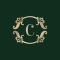 Letter C Alphabet Logo with Luxury Decorative Golden Frame. Elegant Curl Floral Ornament Royalty Free Stock Photo