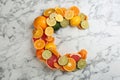 Letter C made with citrus fruits on table as vitamin representation, flat lay Royalty Free Stock Photo