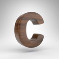 Letter C uppercase on white background. Dark oak 3D letter with brown wood texture. Royalty Free Stock Photo