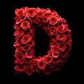 Letter D from the alphabet made of red roses and petals.