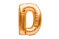 Letter D made of golden inflatable helium balloon isolated on white. Gold foil balloon font part of full alphabet set of upper Royalty Free Stock Photo