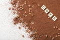 Letter dices on the blended coffee powder