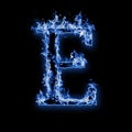 Letter E. Blue fire flames on black Royalty Free Stock Photo