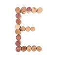 The letter `E` is made of wine corks. Isolated on white background Royalty Free Stock Photo