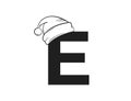 Letter e with santa claus hat. holiday initial letter for Christmas and New Year design. isolated vector image Royalty Free Stock Photo