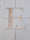 Letter e on walkway