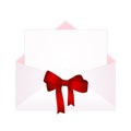 Letter in an envelope decorated with Shiny Satin Gift Bow. Envelope with Clean Card