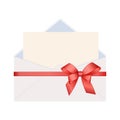 Letter in an envelope decorated with Shiny Satin Gift Bow. Envelope with Clean Card Royalty Free Stock Photo