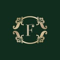 Letter F Alphabet Logo with Luxury Decorative Golden Frame. Elegant Curl Floral Ornament Royalty Free Stock Photo