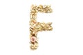 Letter F made from coloured pencil shavings