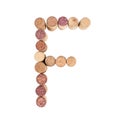 The letter `F` is made of wine corks. Isolated on white background Royalty Free Stock Photo