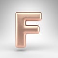 Letter F uppercase on white background. Matte copper 3D letter with shiny metallic texture