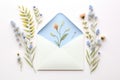 Letter with flowers inside. Love letter with spring flowers. Modern greeting concept.