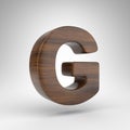 Letter G uppercase on white background. Dark oak 3D letter with brown wood texture. Royalty Free Stock Photo