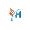 Letter H combined with the fire wing hummingbird icon logo Royalty Free Stock Photo
