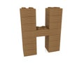 Letter H concept built from toy wood bricks Royalty Free Stock Photo