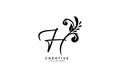 Letter H initial flourishes flower ornament logo