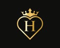 Letter H Logo With Crown and Love Shape. Heart Letter H Logo Design, Gold, Beauty, Fashion, Cosmetics Business, Spa, Salons, And Royalty Free Stock Photo