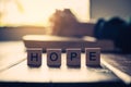The letter `HOPE` is placed on the table with Christians praying and praying to God in the back Royalty Free Stock Photo