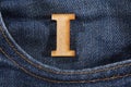 Letter I of the alphabet - blue jeans texture background. Top view Royalty Free Stock Photo