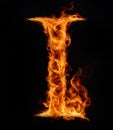 Letter I burning in fire, isolated on black background. Royalty Free Stock Photo