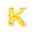 Letter K of alphabet made of bio cereals corn flakes and paper cut isolated on white. Typeface for healthy food store