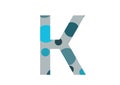 letter K of the alphabet made with several blue dots and a gray background