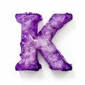 letter K made of translucent purple stone on white background generative AI