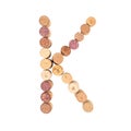 The letter `K` is made of wine corks. Isolated on white background Royalty Free Stock Photo