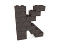 Letter K from rusty metal toy bricks
