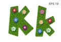 Letter Kk with a texture of grass and flowers