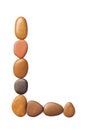Letter L made of marine small pebbles, top view. Alphabet made of stones Isolated