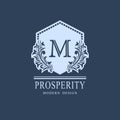 Letter M. Luxury Coat of Arms with a Floral Wreath. Art Logo Design. Luxurious Monogram for Personal or Family Emblem, Business