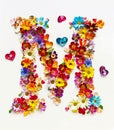 The letter m made of flowers and hearts