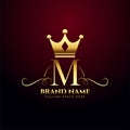 Letter M monogram logo with golden crown design Royalty Free Stock Photo
