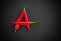 Letter A made of red hot chili peppers