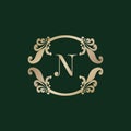 Letter N Alphabet Logo with Luxury Decorative Golden Frame. Elegant Curl Floral Ornament Royalty Free Stock Photo
