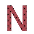 Letter N of the alphabet made with a pattern of sunflowers with a dark pink background