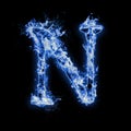 Letter N. Blue fire flames on black Royalty Free Stock Photo