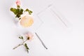 Letter, pen and white envelope on white background with pink english rose. Invitation cards or love letter. Birthday Royalty Free Stock Photo