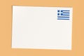 Letter Or Postcard From Greece: Blank White Card with Greek Flag Postage Stamp, 3d Illustration