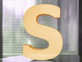 Letter S in golden colour