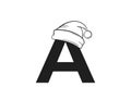 Letter a with santa claus hat. initial letter for Christmas and New Year design. isolated vector image Royalty Free Stock Photo