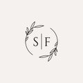 Letter SF wedding monogram logo design with simple natural circle leaf frame Royalty Free Stock Photo