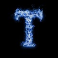 Letter T. Blue fire flames on black Royalty Free Stock Photo
